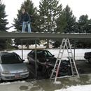 Cleaning snow off the carport
