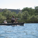 Scott and Jason paddling Ainsley around