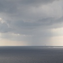 Can you see the ship way off in the distance in the clouds?
