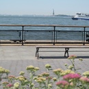 View of Statue of Liberty and the ferry that takes you to it.