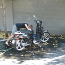 Jason washing his new scooter