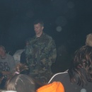 Singles ward campout - Jason telling a joke around the campfire