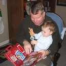 Playing with a book with Grandpa