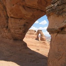 A view of Delicate Arch through a window
