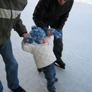 Ainsley ice skating with Scott & Jason