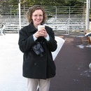 Angela keeps warm with hot chocolate