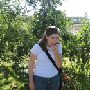 Kerry sneaking a bite while picking apples
